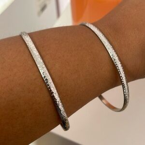 2 bangles 9 1/2 inch wide